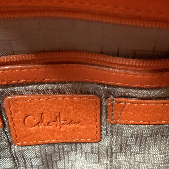 Cole Hahn orange handbag with fringe and silver hardware. - Picture 13 of 16
